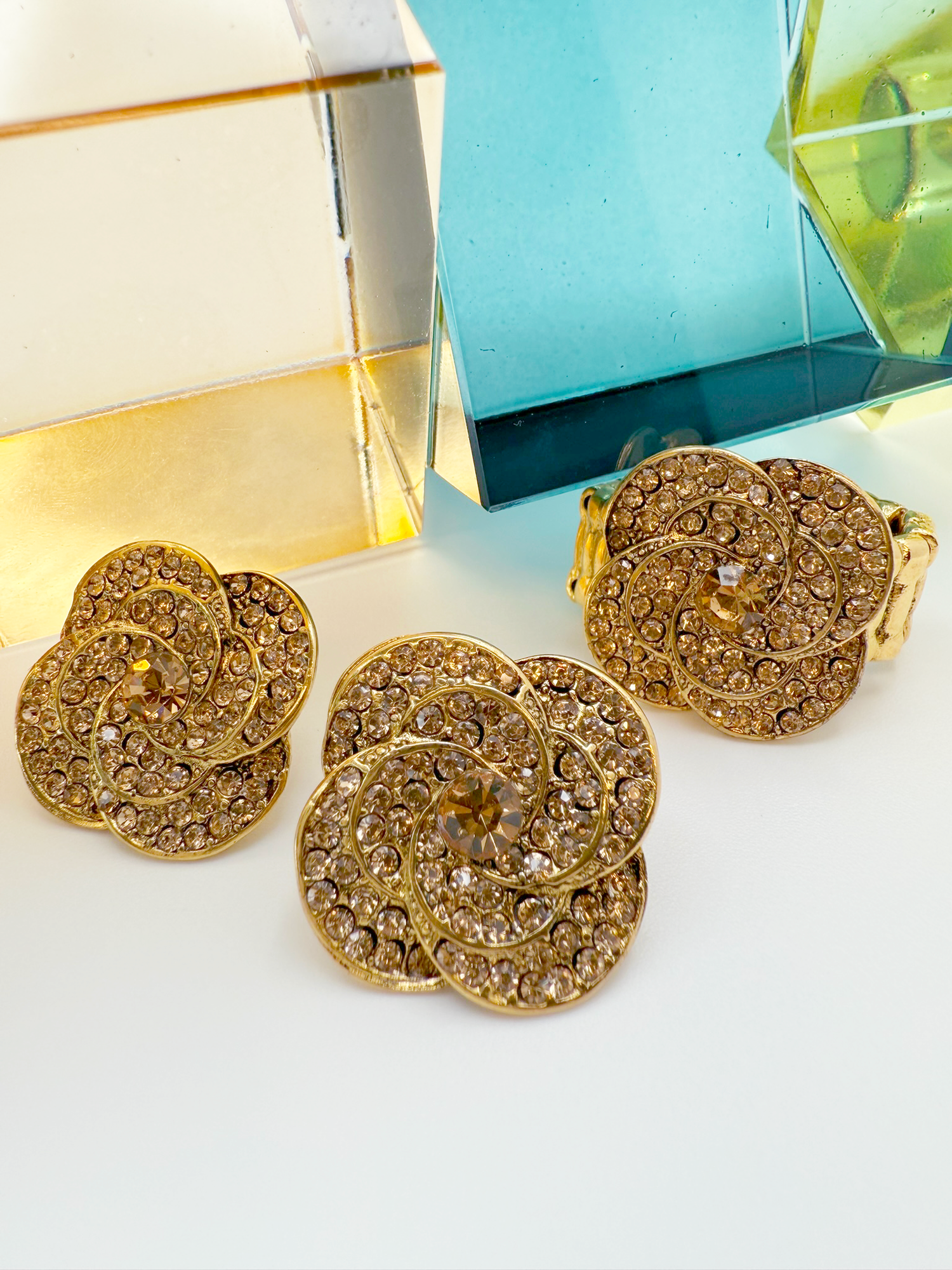 Dazzling Floral Swirl Stud Earrings – Gold &amp; Crystal Design