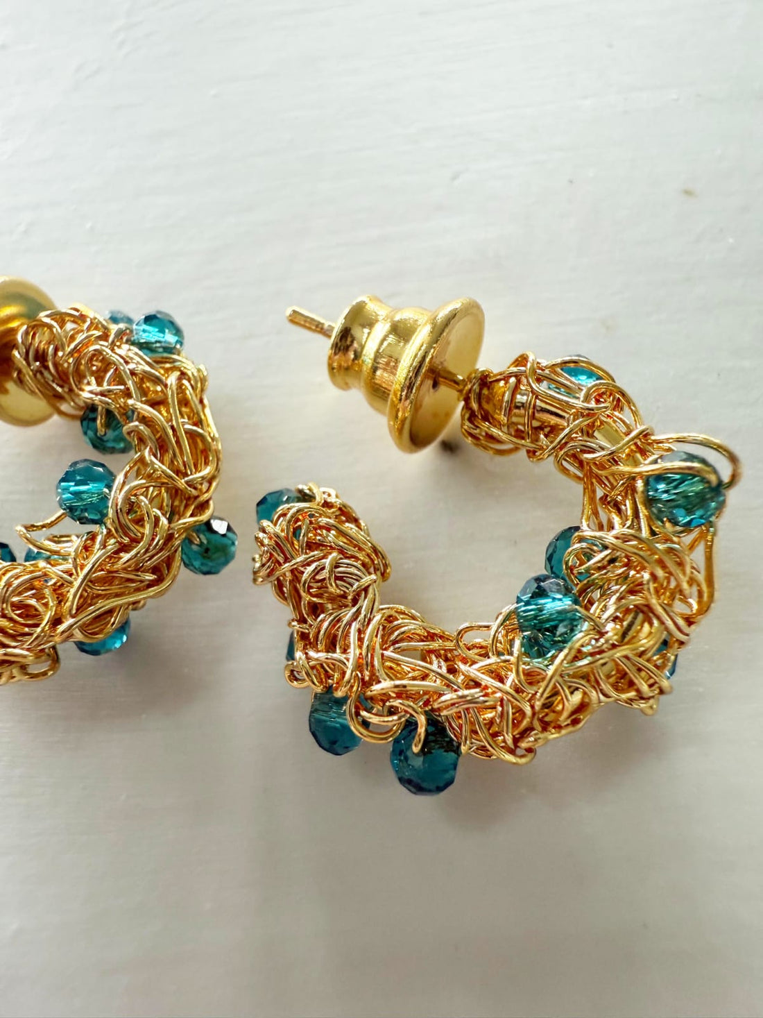 Azure Mirage Gold Hoop – Handmade 18K Gold-Plated Crochet Earrings with Blue Crystal Details