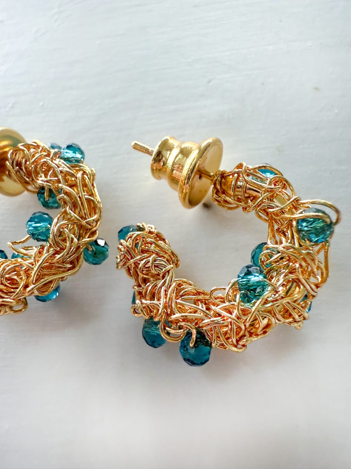 Azure Mirage Gold Hoop – Handmade 18K Gold-Plated Crochet Earrings with Blue Crystal Details