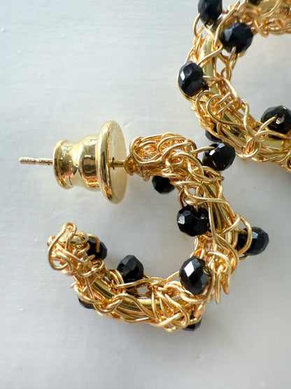 Onix Mirage Gold Hoops – Handmade 18K Gold-Plated Crochet Earrings with Black Crystal Accents